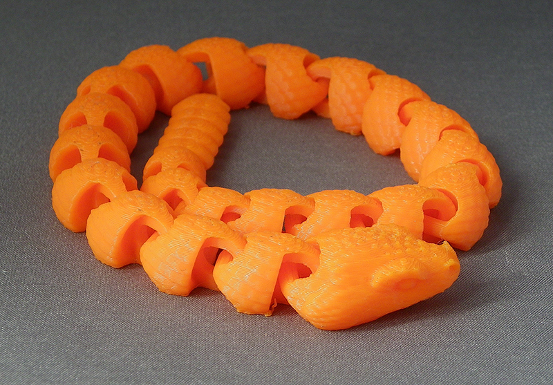 (image for) 3D Prints - Beweegbare Ratelslang 1 - Zonnig Oranje (Sunny Orange)